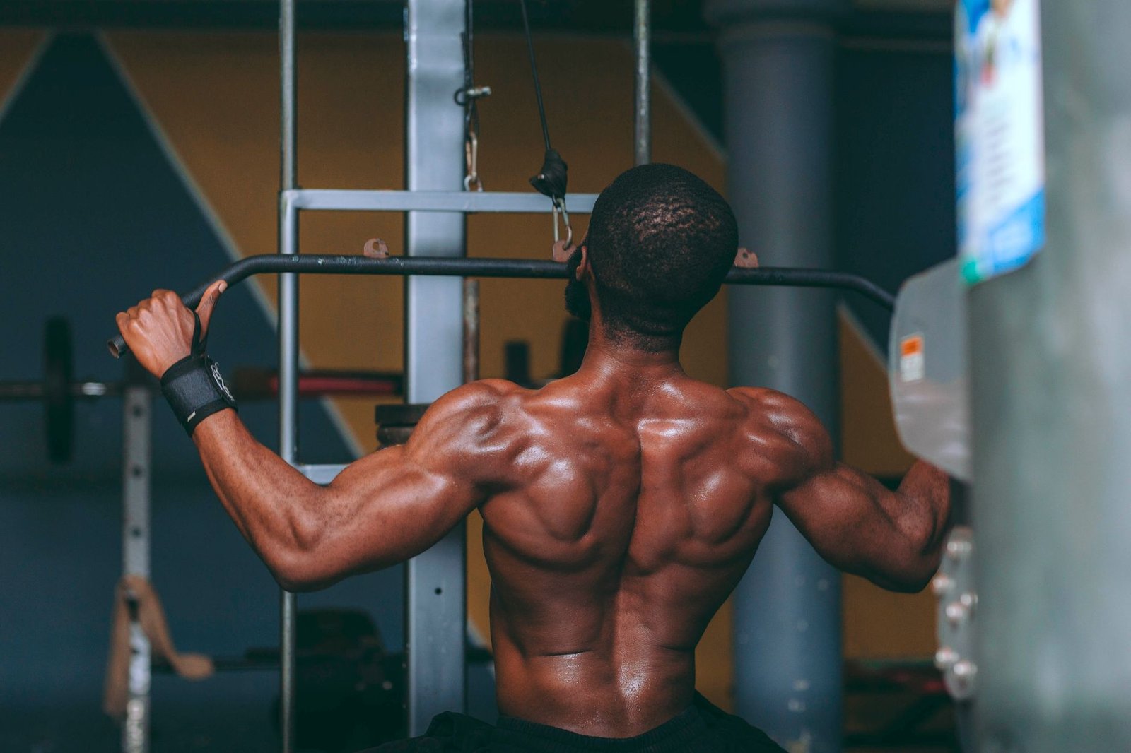 Gym scene with lighter weights maintaining strength gains