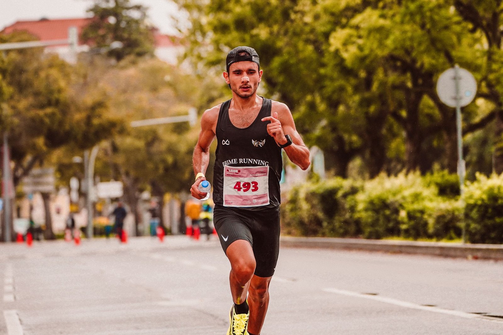 Athlete taking carbs during training at regular intervals
