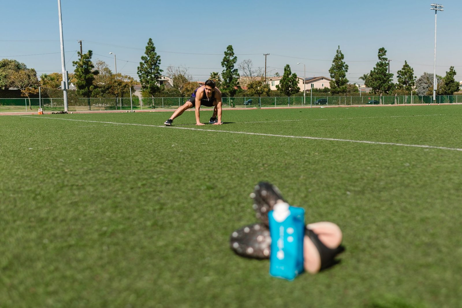 Close-up of hamstrings warm-up routine before long distance run