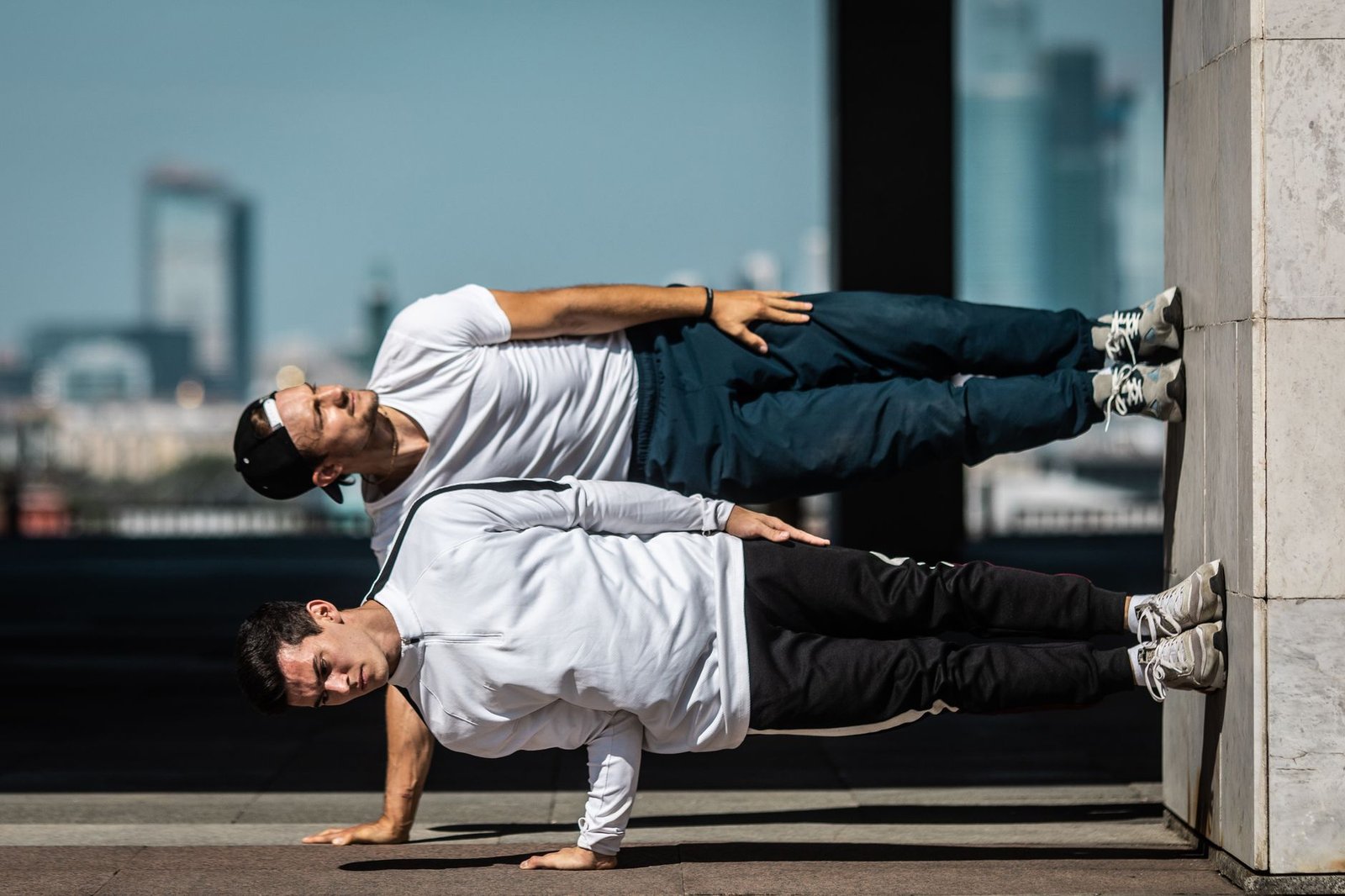 Close-up of core stability exercises near urban sidewalk