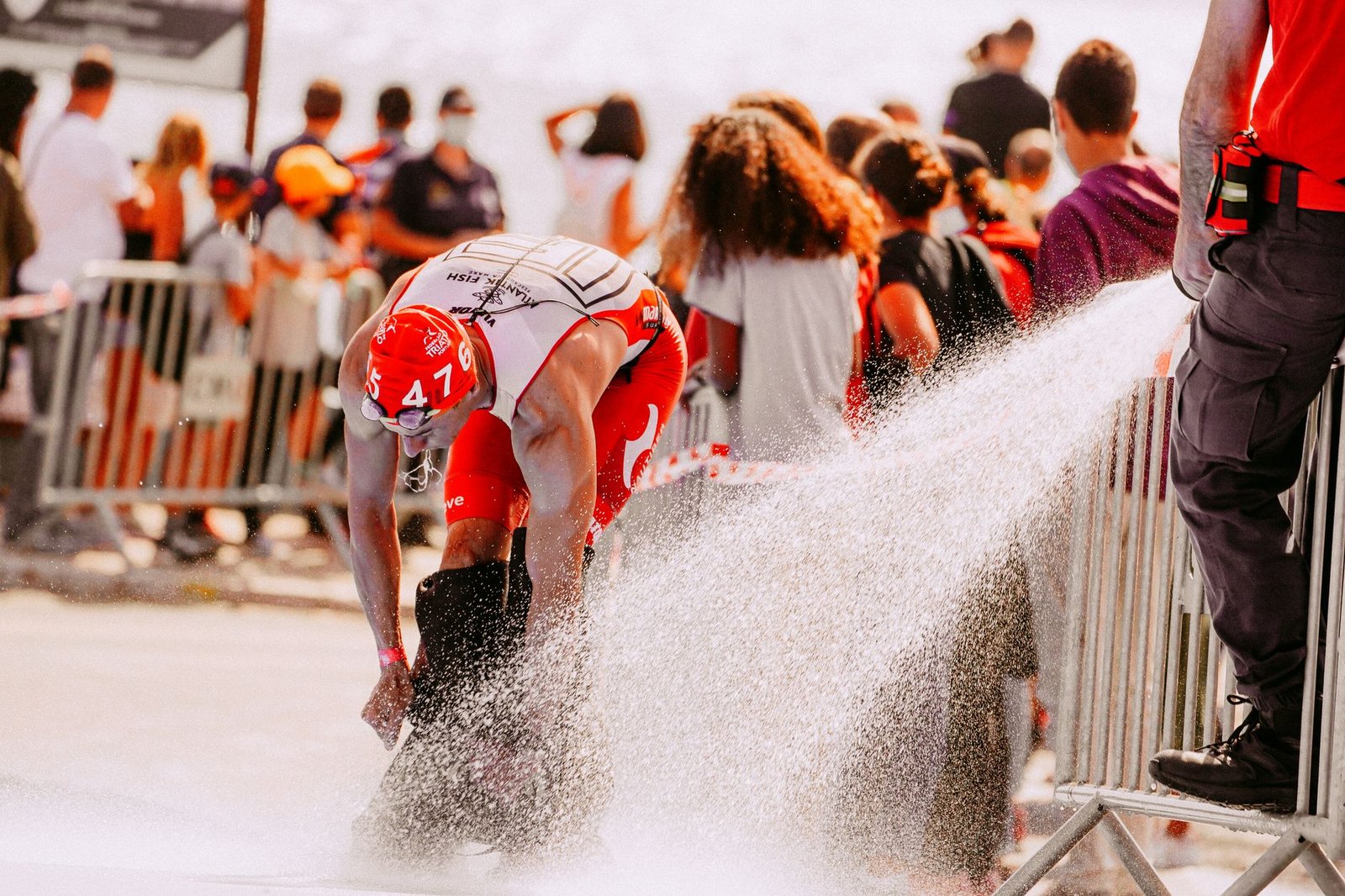 Cyclist preparing electrolyte tablets in London summer heat