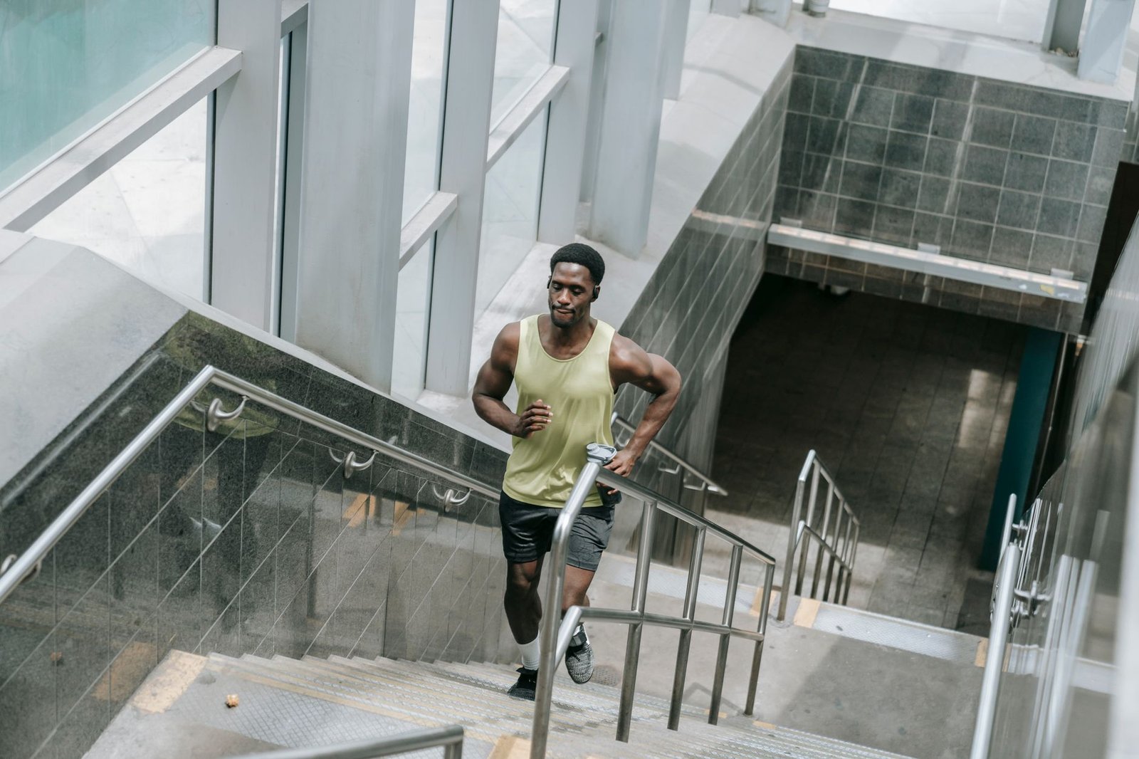 Athlete doing calf and glute activation before hill training