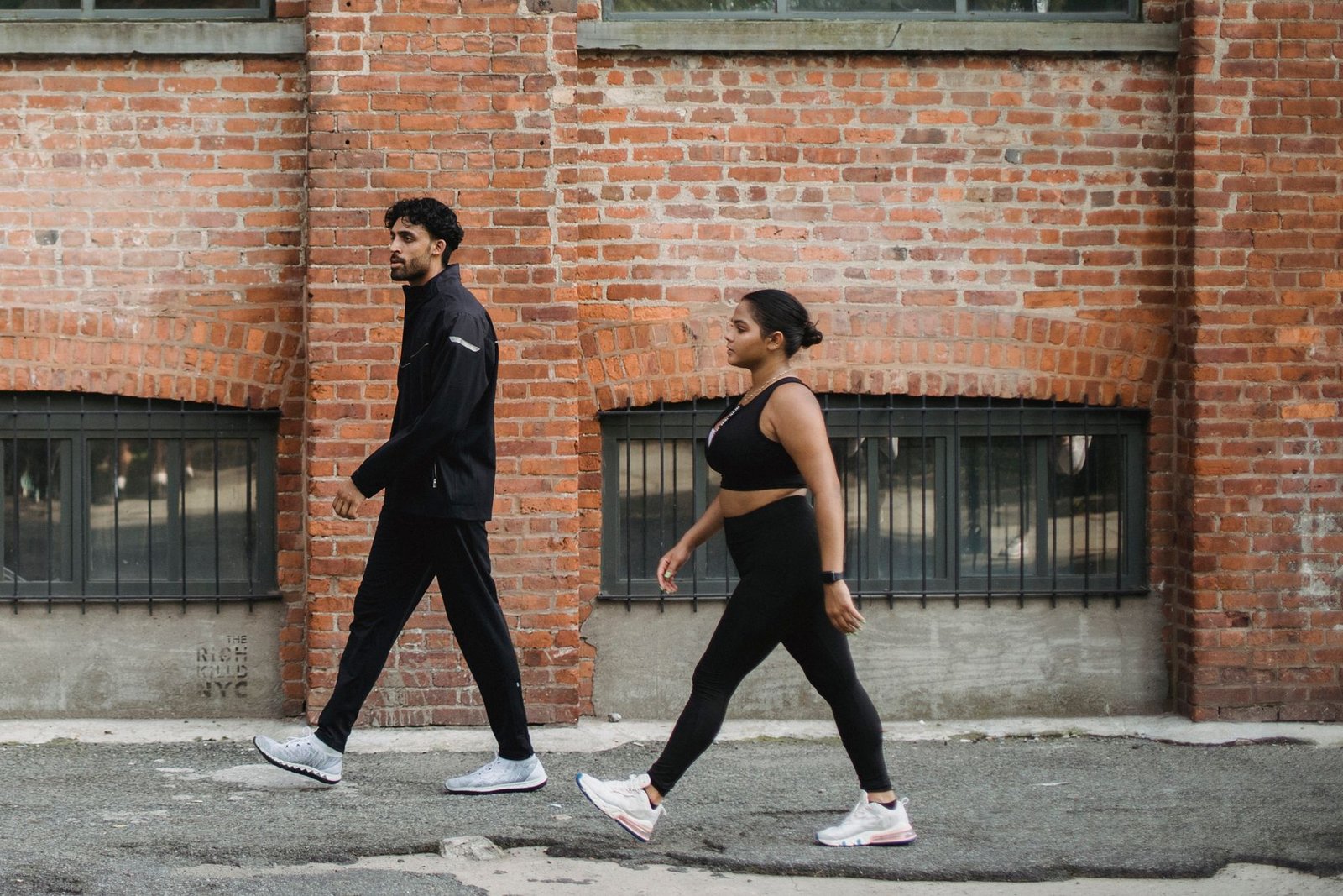 Athlete stretching after brisk walks during race week training
