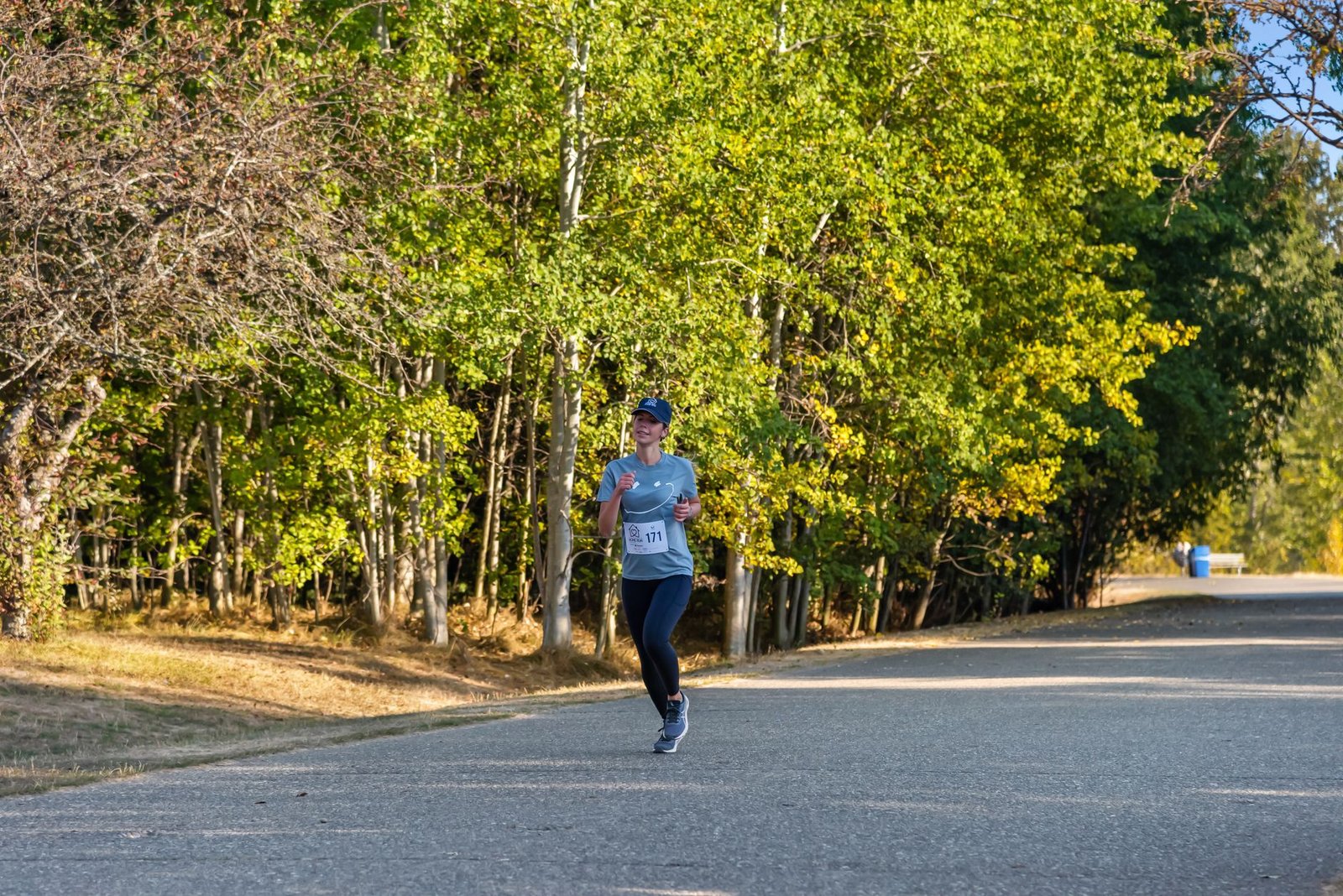 Close-up of relaxed shoulders improving running form efficiency