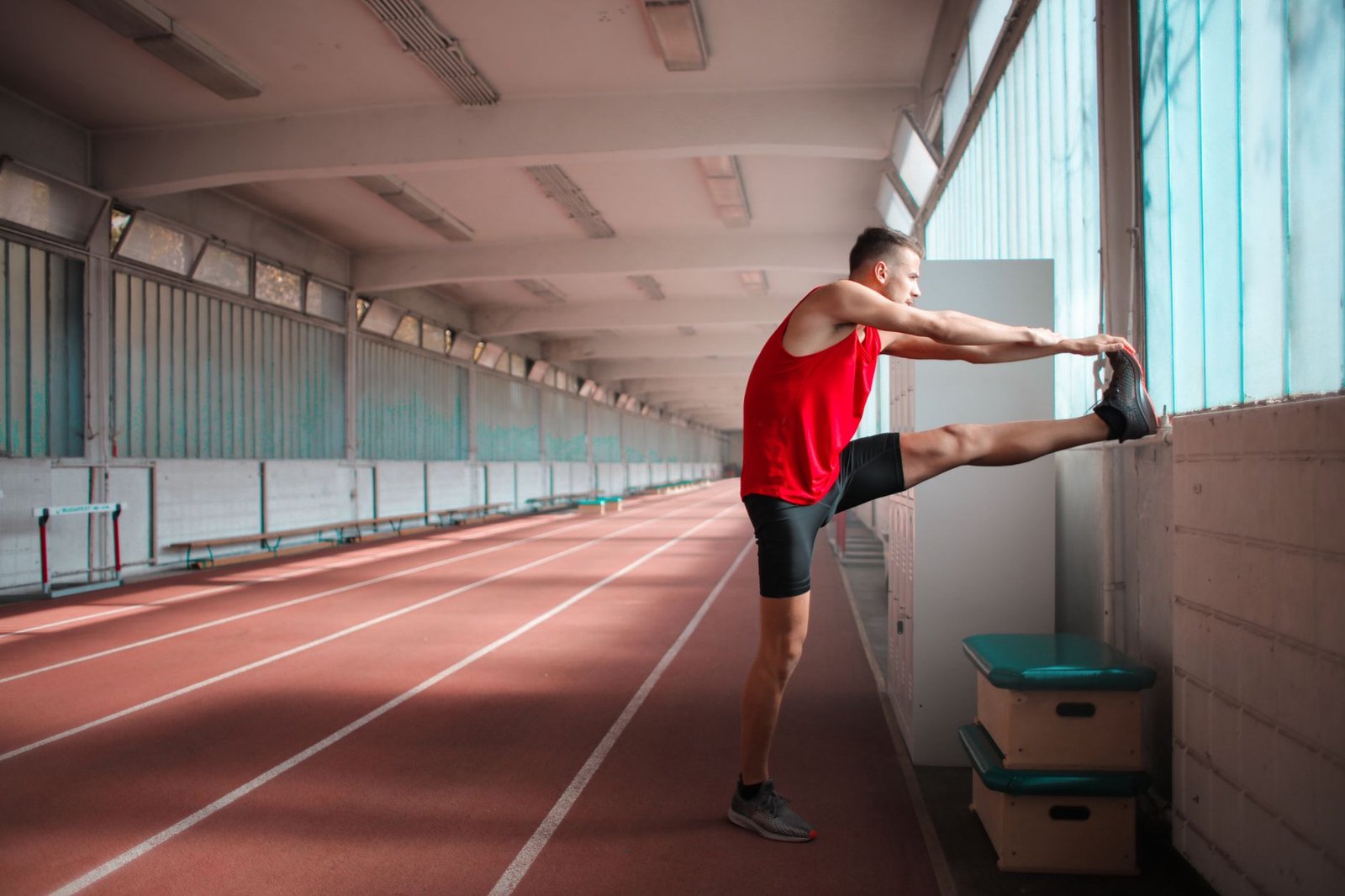 Athlete doing gentle warm-up instead of aggressive stretching