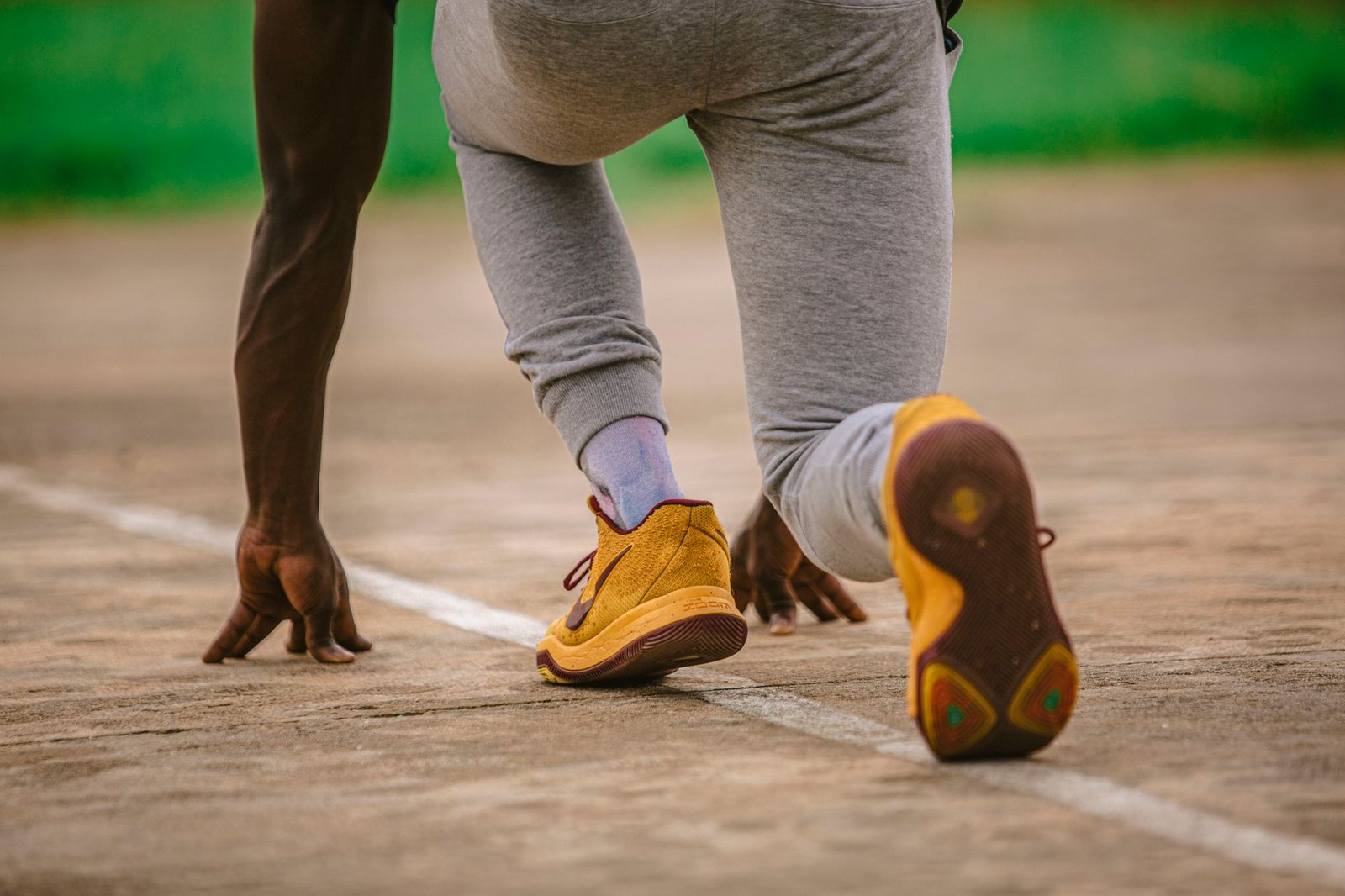 Coach guiding training plan emphasizing light sprints for marathon
