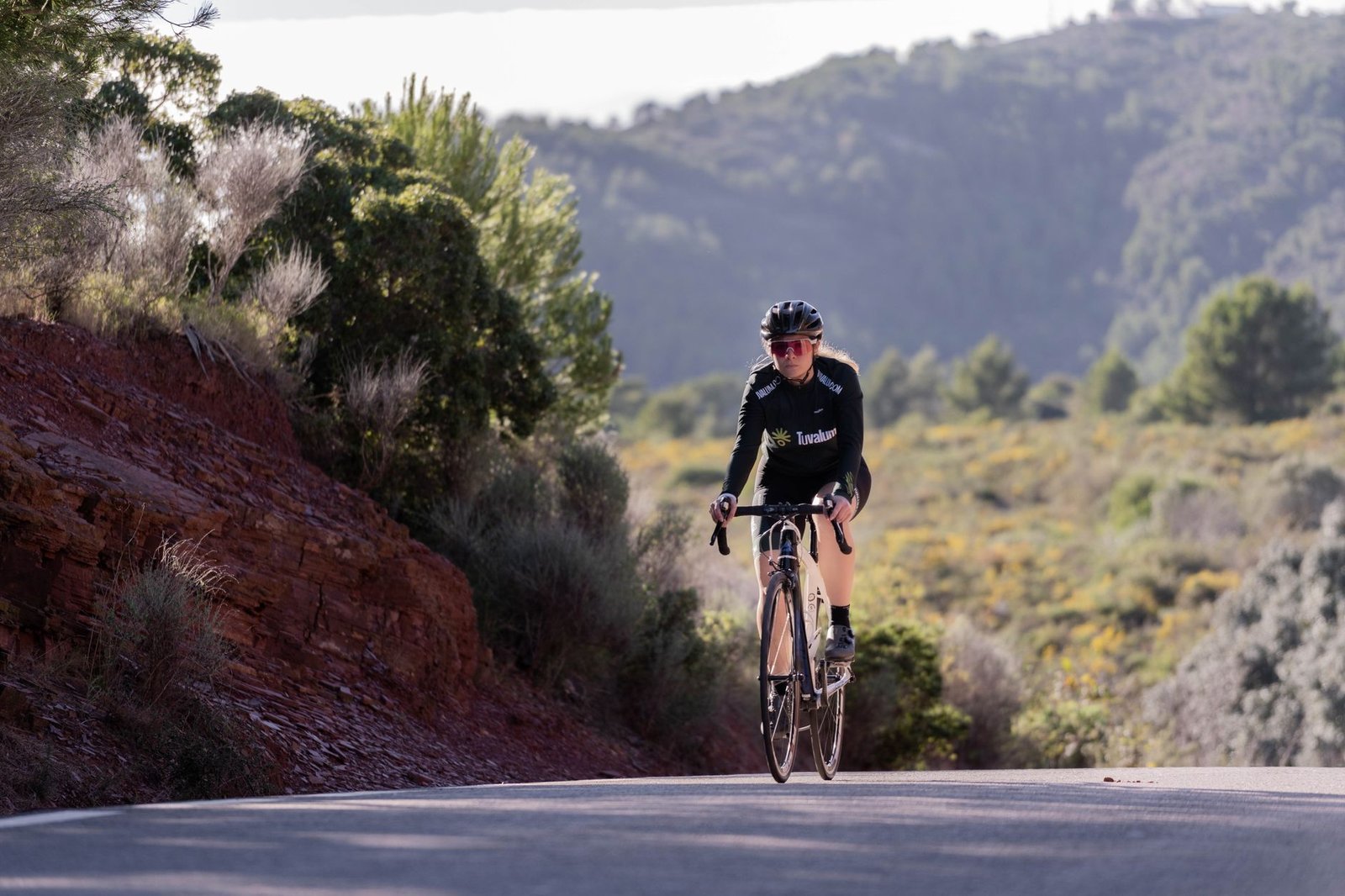 Coach explains squat variations for consistent hill climbing power