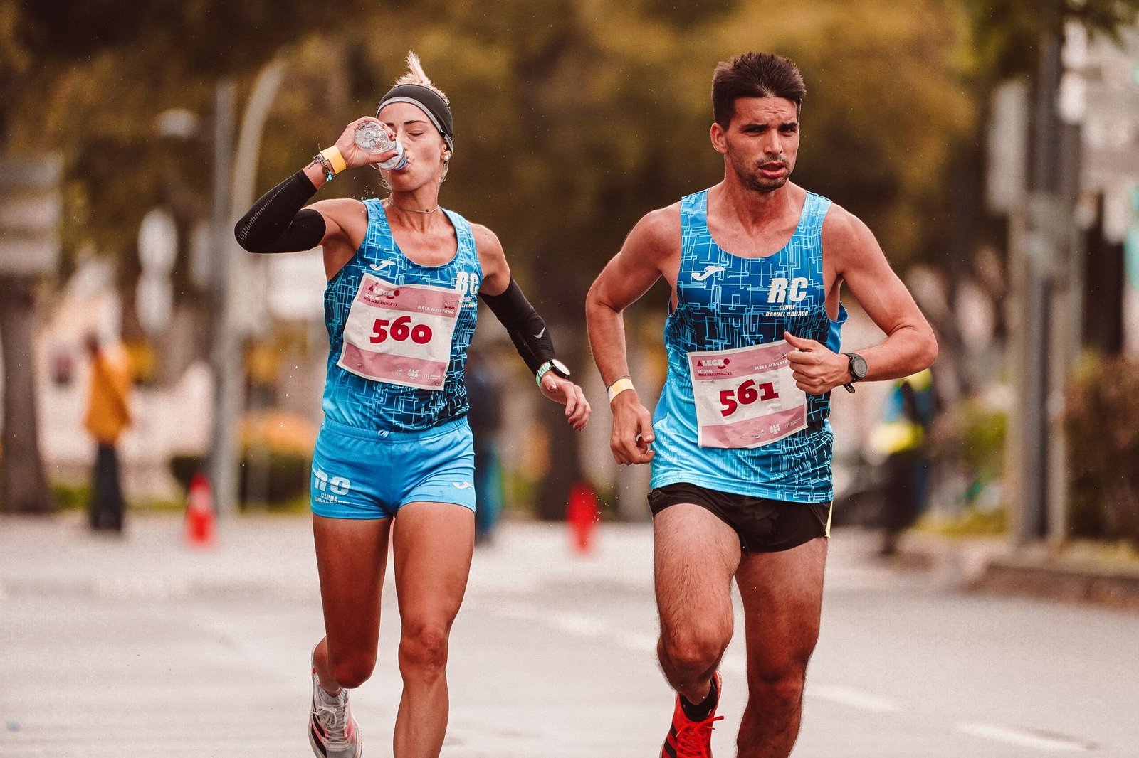 Sports drink and water bottles on trail for hydration planning