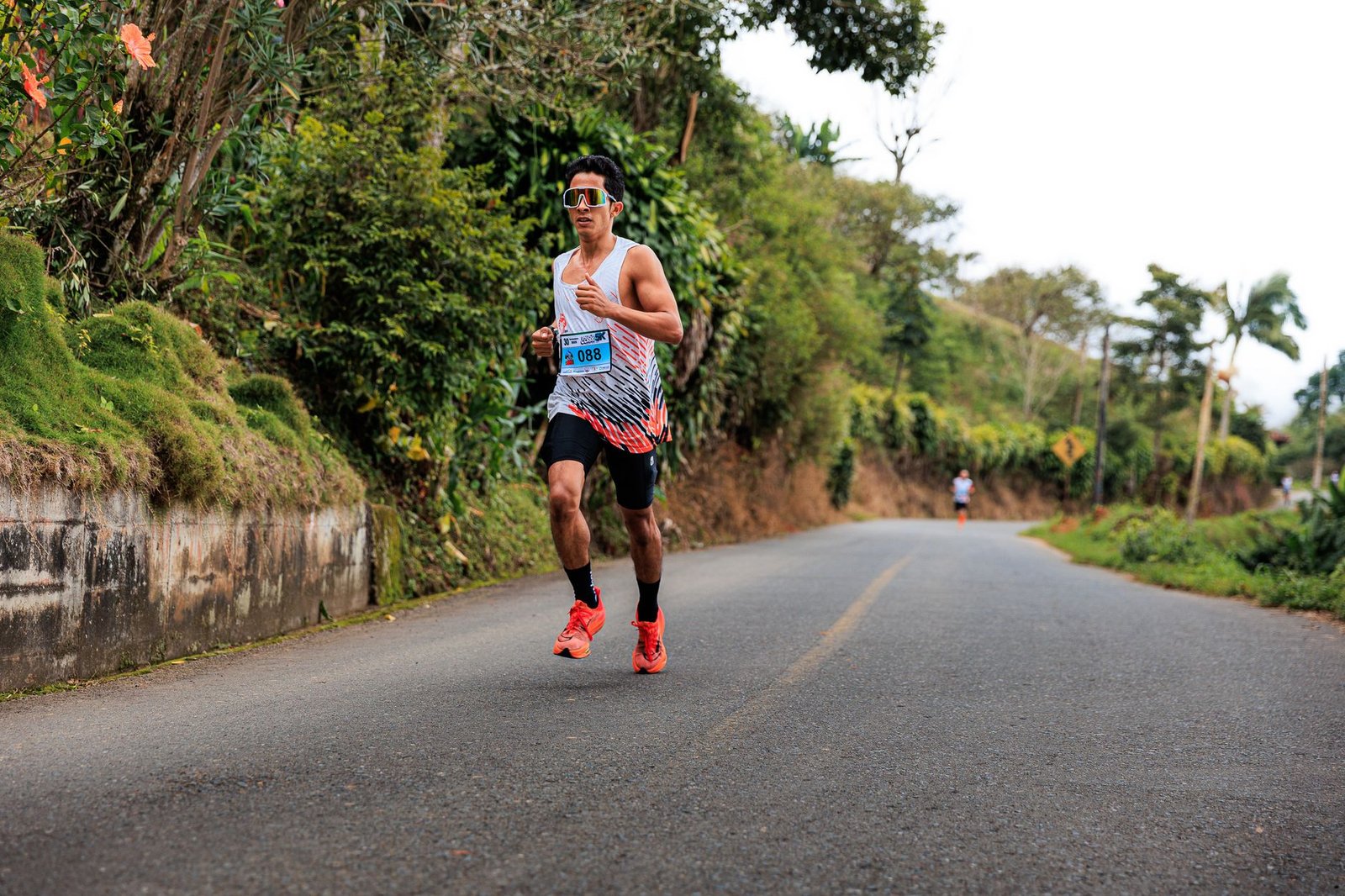 Long-run route passing illuminated shops and bustling crowds
