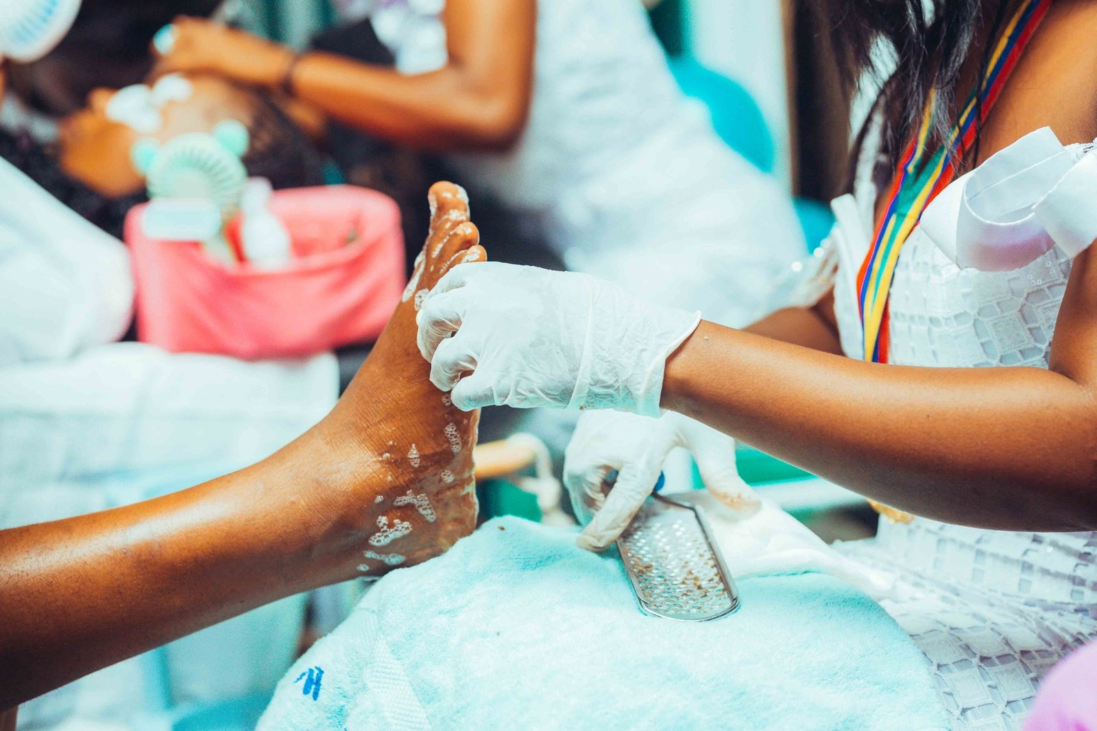 Athlete checking feet for hot spots near finish line