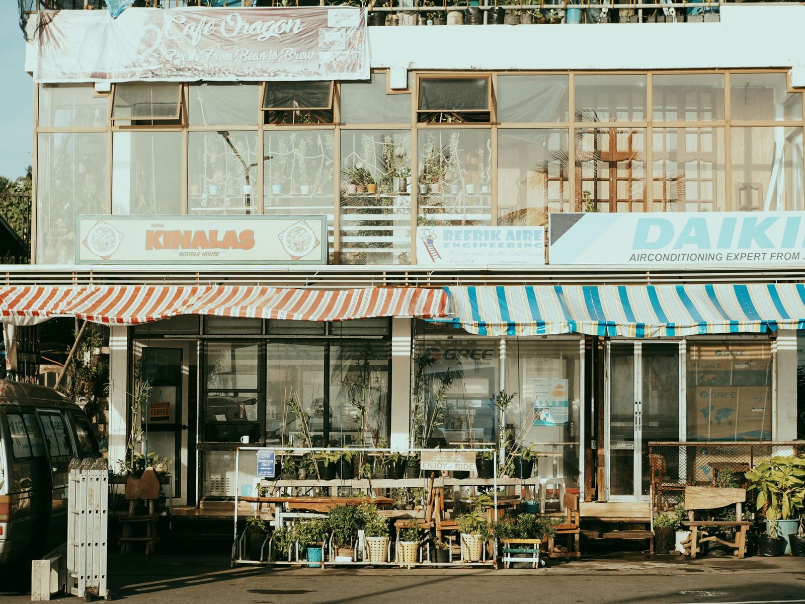 Side-by-side view of shops and services along route