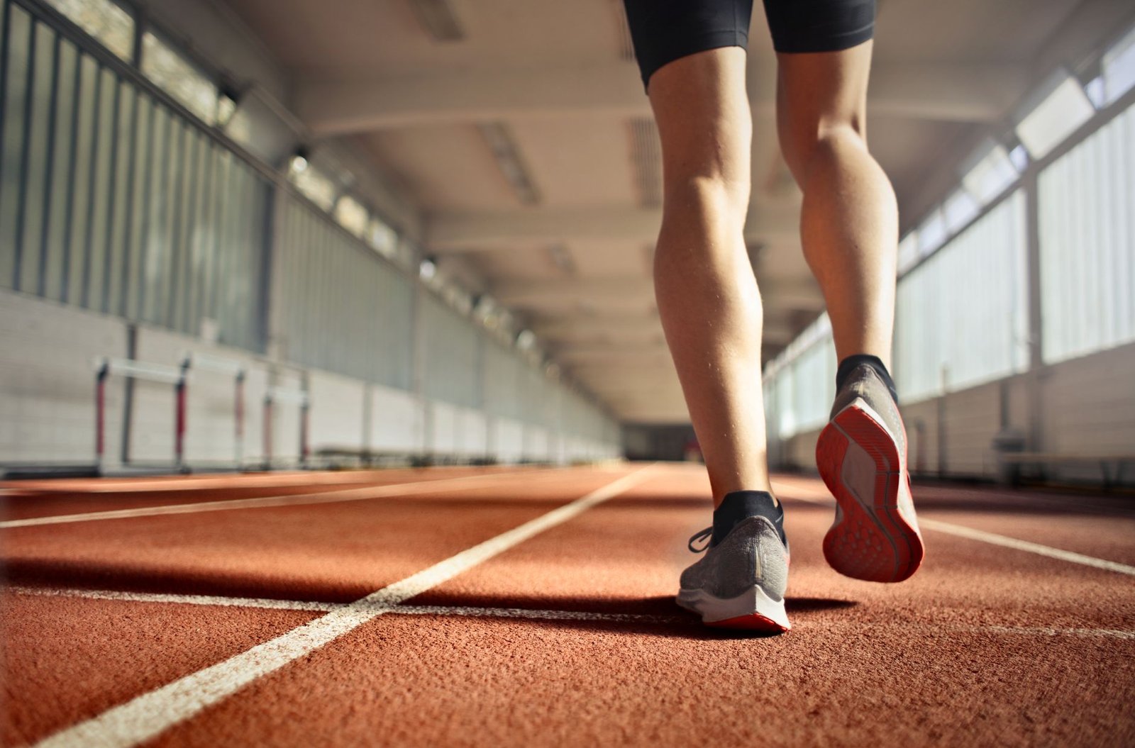 Coach guides shift from recovery pacing to faster intervals