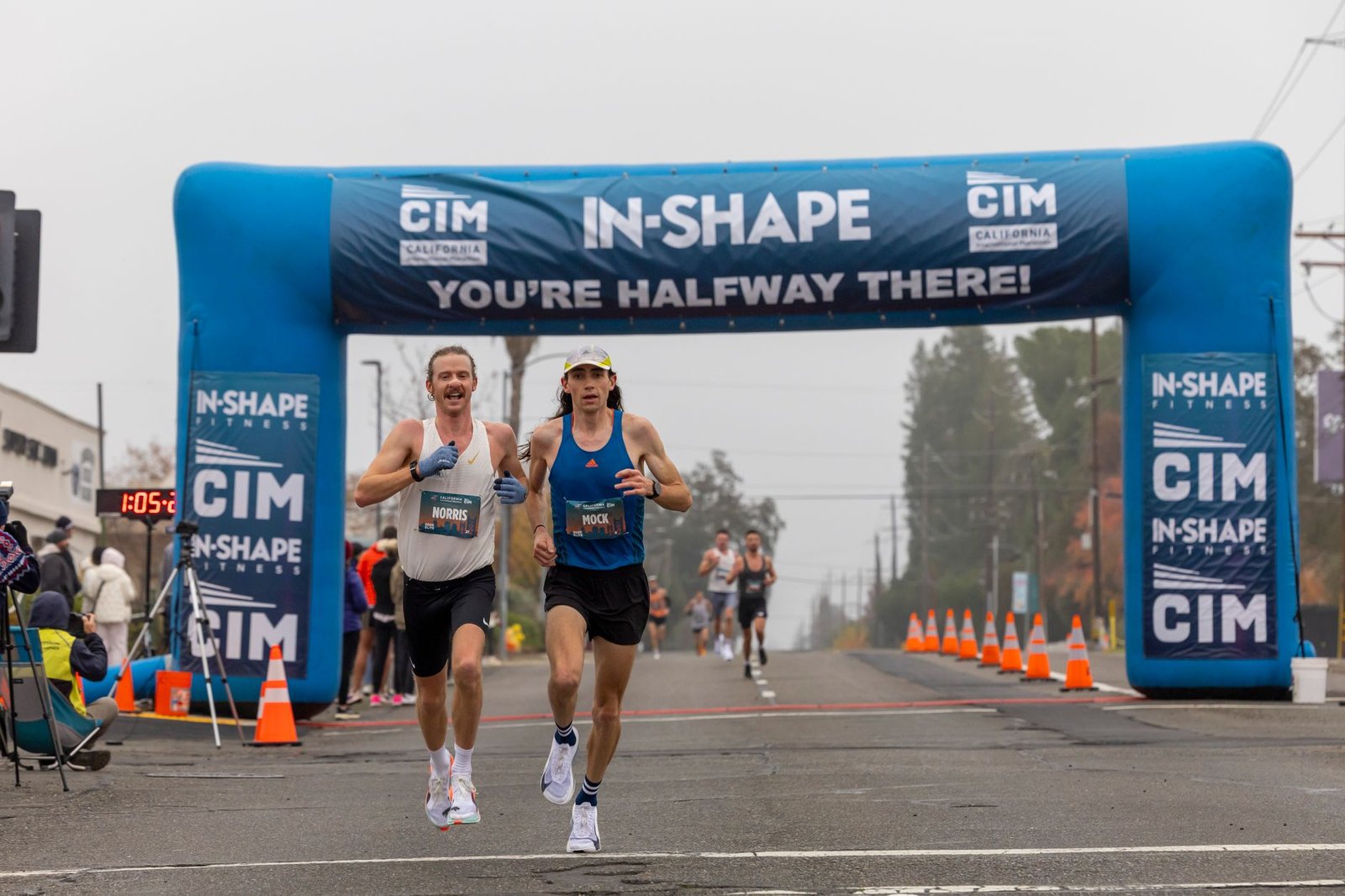 Runner adjusting pace based on rain probability and heat forecast